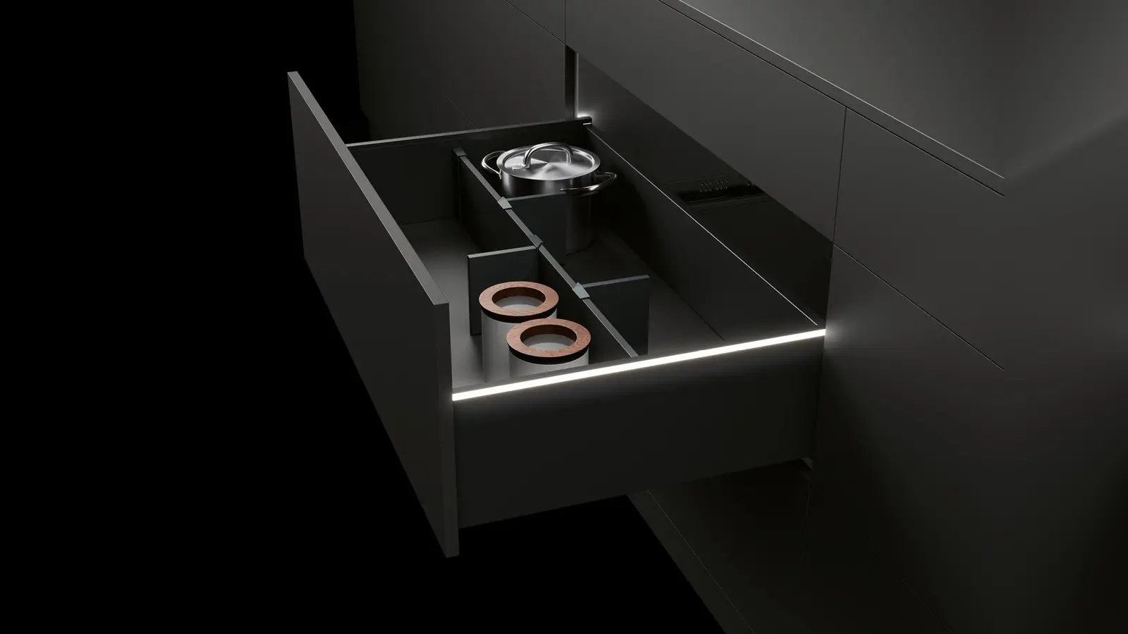 Hochwertig, einzigartig, designstark, individuell. Homogenes LED-Licht (4.000 Kelvin) in Form aufclipsbarer Profile verleiht den geöffneten Schubkästen ganz besondere Akzente durch ein außergewöhnliches Lichtdesign.  (Foto: AMK)