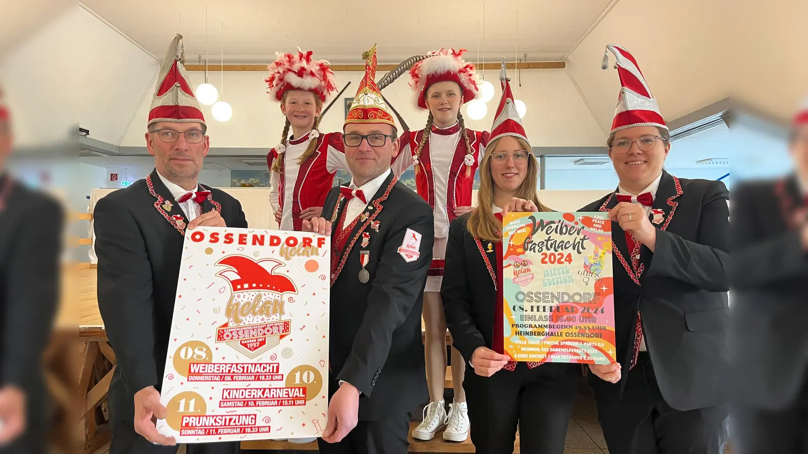 Laden ein zum Ossendorfer Karneval 2024: das Vorstands-Team der Karnevalsgesellschaft Rot-Weiss (v.l.) Martin Wiegand, Präsident Wilhelm Engemann, Maren Petry und Tanja Friedrich. Auf ihre Auftritte freuen sich (hinten l.) Anna Franziska Berendes und Nele Schütze von der Juniorengarde der Rot-Weissen Funken.  (Foto: privat)