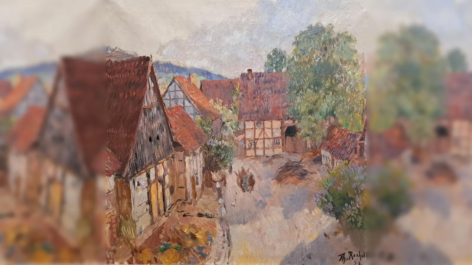Das Titelbild der Ausstellung lässt die Dorfstraße in Pastelltönen wirken. (Foto: Theodor Rocholl, 1923, aus dem Nachlass von Imke Beischall.)