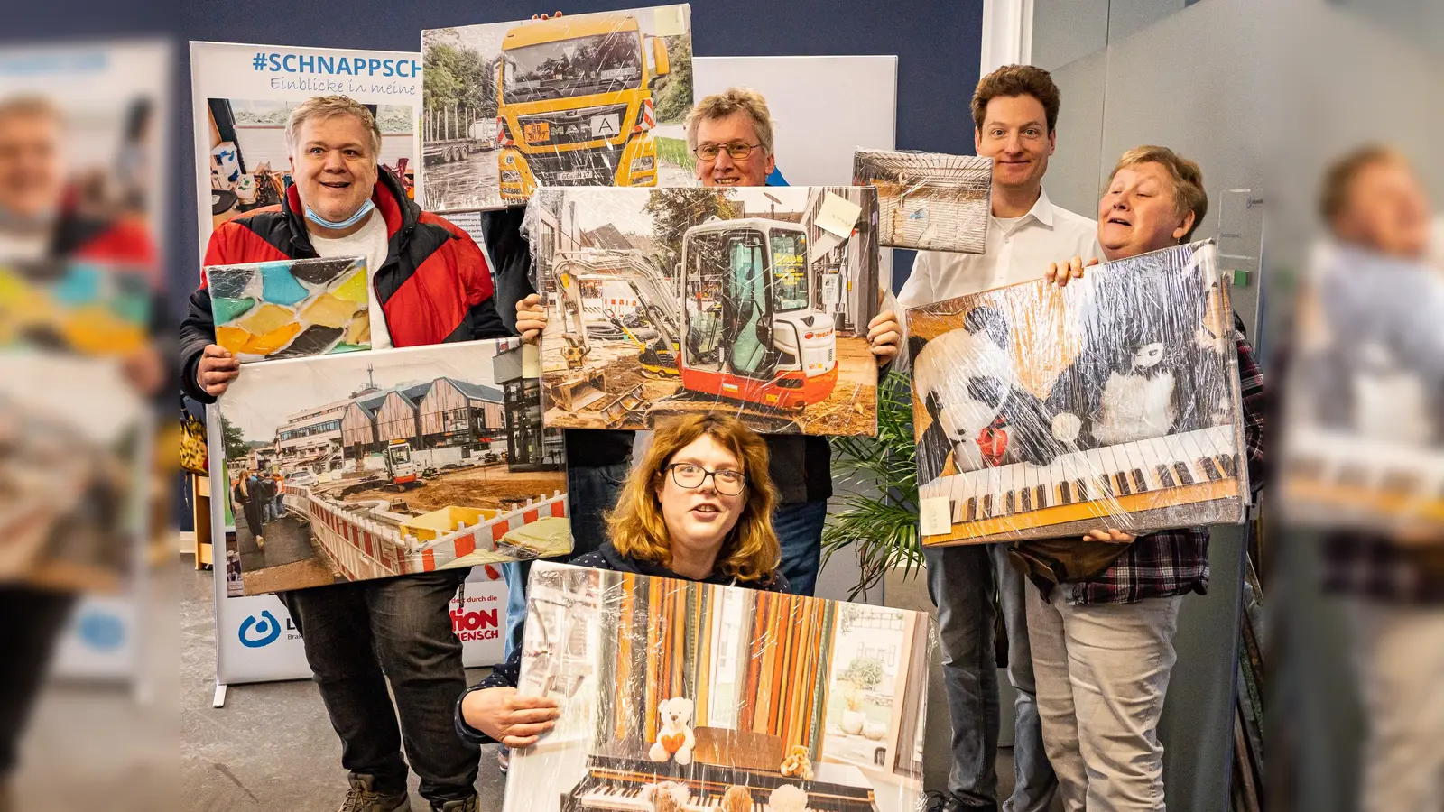Einige Teilnehmer präsentieren gemeinsam mit Jerome Major (2. von rechts) ihre Bilder. (Foto: privat)