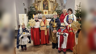 Unterwegs auch bei widriger Witterung: Die Sternsinger von Beller. (Foto: R. Köhne)