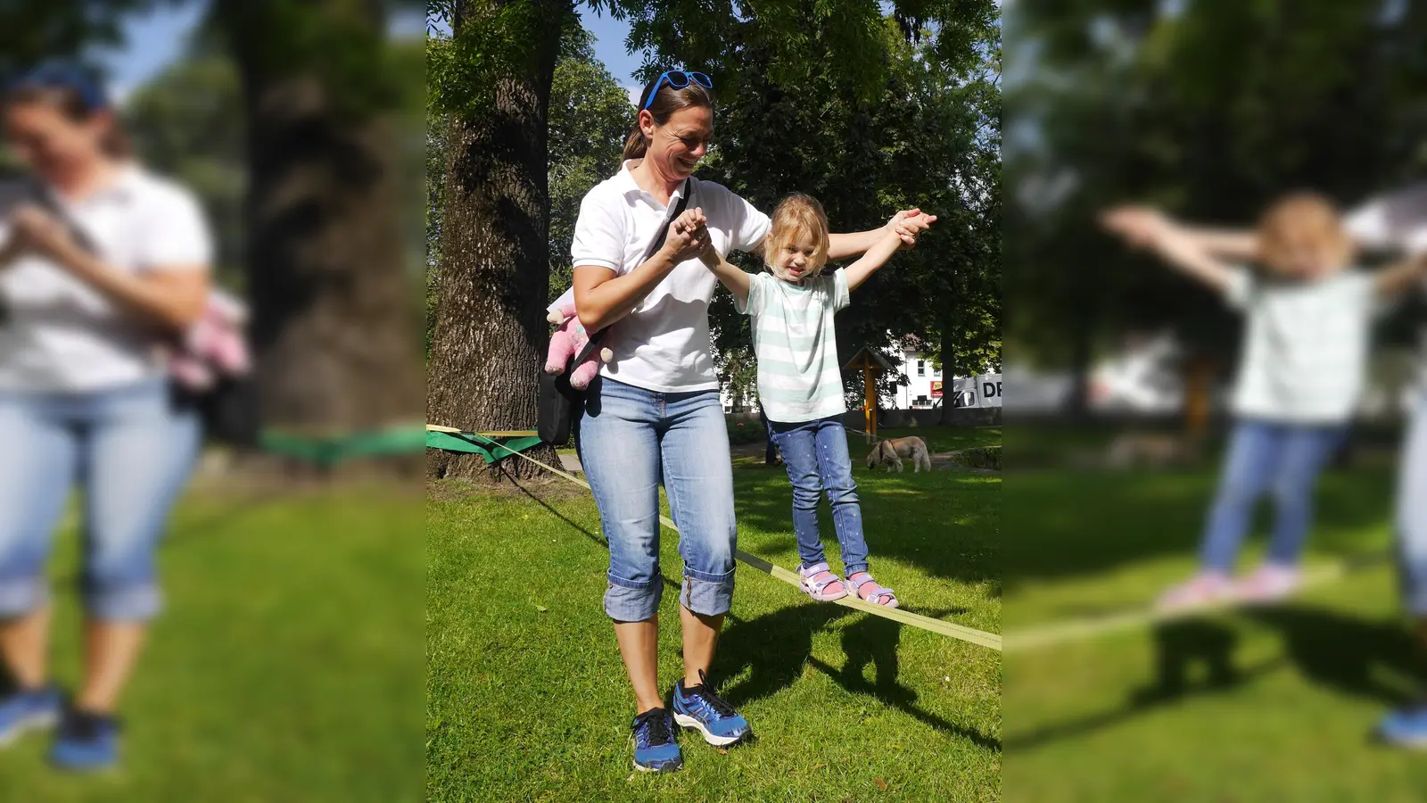 Beim Slackline gilt es, die Balance zu halten, was hier mit Mamas Hilfe schon ganz gut klappt. (Foto: Schwannecke/Kreissportbund)